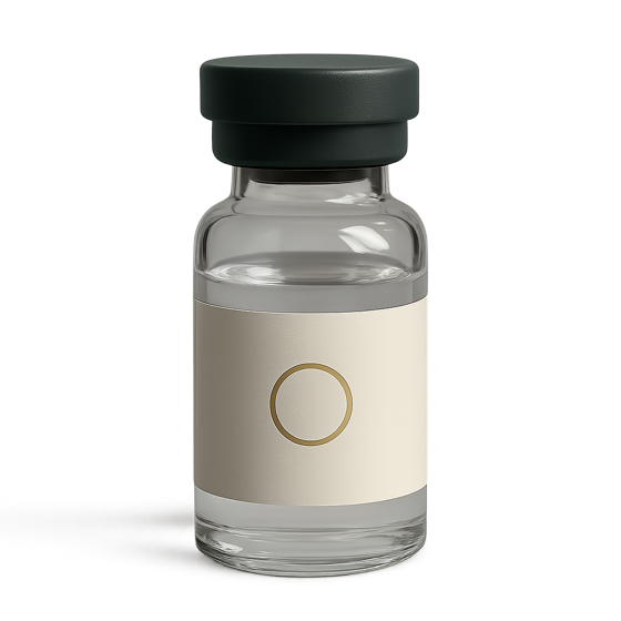 Clear glass vial with a cream label and gold emblem